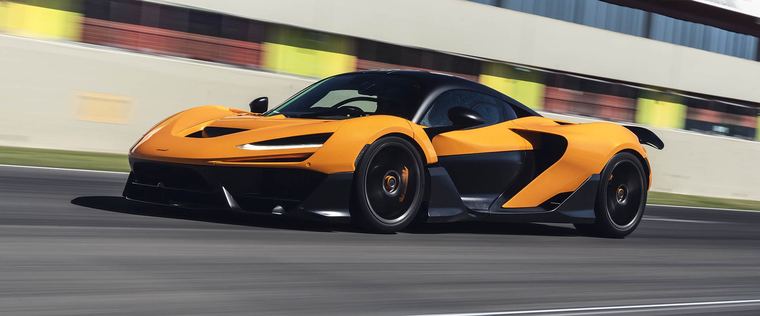 An orange sports car on a track
